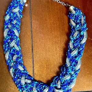 Blue, turquoise, silver multi strand braided necklace with matching bracelet.